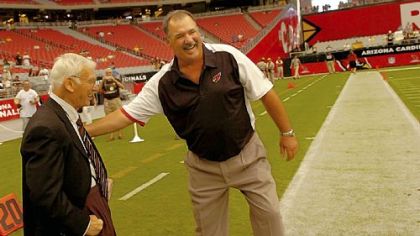 Steelers owner Dan Rooney is greeted by Cardinals assistant head coach/offensive line coach Russ Grimm in September 2007 at University of Phoenix Stadium in Glendale, Ariz.