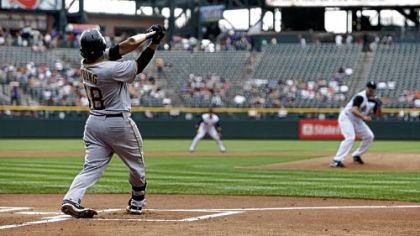 Delwyn Young flies out against Rockies starter Jason Marquis to end the first inning yesterday in Denver.