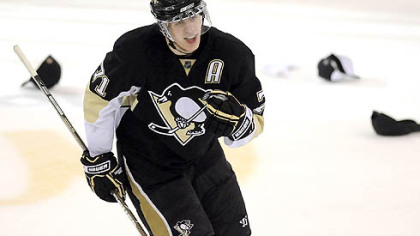 Evgeni Malkin celebrates his third goal against the Hurricanes in the third period of game 2 of the Eastern Conference Finals at Mellon Arena last night.