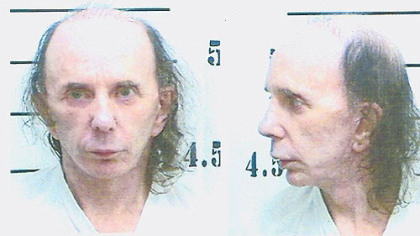 Known for his wild hairstyles over the years, Phil Spector appears in his June 5 prison booking photo.
