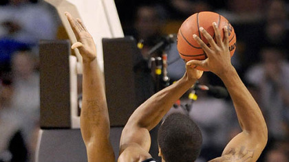 Pitt's DeJuan Blair defends as Xavier's Jamel McLean drives to the net in the first half of tonight's NCAA East Regional in Boston.