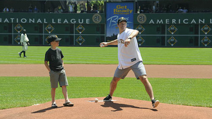 Bill Guerin throws out the ceremonial first pitch at the Pirates game yesterday at PNC Park.