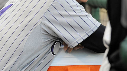 Former Pirates manager Jim Tracy watches as his team bats against the Pirates Friday night. Tracy is the bench coach for the Rockies.