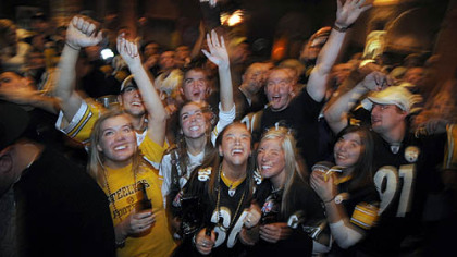 Steelers fans watch the AFC championship game at the Carson City Saloon on Pittsburgh's Southside.