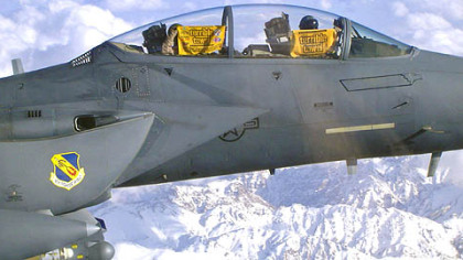 Air Force F-15E Strike Eagle pilots attached to the 4th Fighter Wing display their Terrible Towels. The 4th Fighter Wing flies out of Seymour Johnson Air Force Base in Walnut Creek, N.C.  The photograph was submitted by Bobby McGrath, instructional designer at the Naval War College, Newport, R.I.