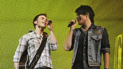 Kris Allen, left, and Adam Lambert sing during the American Idols concert Saturday night.