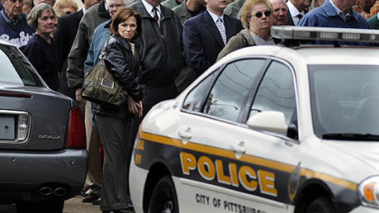 Pittsburgh police officers and the public lined up at Winter Funeral Home in Bloomfield to pay their respects to officer Paul J. Sciullo II, who was killed Saturday.