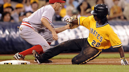 Andrew McCutchen fouls off a first-inning pitch from Nationals pitcher Collin Balester Sunday.