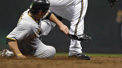 Andy LaRoche is forced out at second by Milwaukee Brewers' Felipe Lopez after Pirates' Ryan Doumit's fielder's choice in the third inning of last night's game in Milwaukee. the Pirates fell into a big hole early and lost, 8-6.