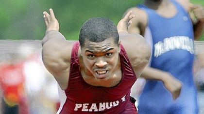 Pierre Carr lunges for the finish in winning the Class AAA 100-meter dash.