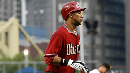 Diamondbacks outfielder Chris Young trots home past Pittsburgh Pirates pitcher Zach Duke after hitting a two-run home run in the fourth inning.