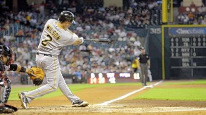 Pirates shortstop Jack Wilson hits a two-run home run during the third inning of last night's road win. Outfielder Andrew McCutchen scored on the homer.