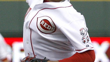 Reds pitcher Johnny Cueto throws against the Pirates during the first inning of the second game.