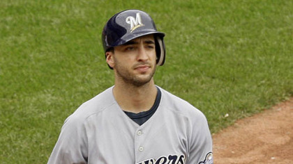 Brewers outfielder Ryan Braun flips his bat after striking out swinging with a man on third base during the ninth inning.