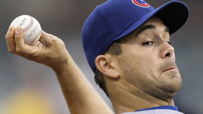 Cubs pitcher Ted Lilly throws in the first inning of last night's game.