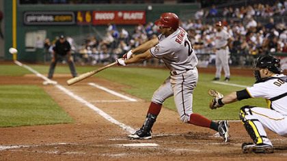 Diamondbacks outfielder Alex Romero hits a two-run RBI double in the 12th inning.