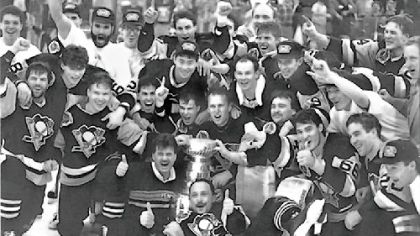 The Penguins celebrate around the Stanley Cup after their 1991 victory. "When you look back on the whole career, the main goal, the reason you play the game, is to win the Stanley Cup. It's the ultimate prize." -- Joe Mullen