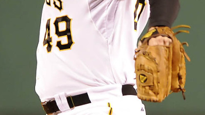 Pirates pitcher Ross Ohlendorf delivers a pitch.