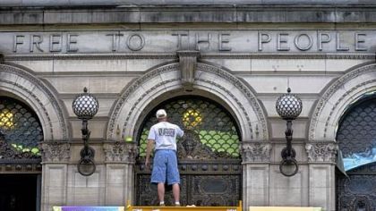 Carnegie Library has experienced budget and service cuts despite the fact that library visits were at a 17-year high.