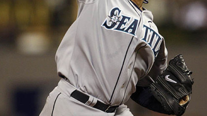 Felix Hernandez of the Mariners pitches during the sixth inning.