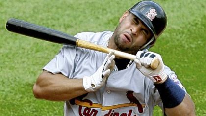 St. Louis Cardinals' Albert Pujols is hit by a pitch from Pirates pitcher Matt Capps in the eighth inning yesterday.