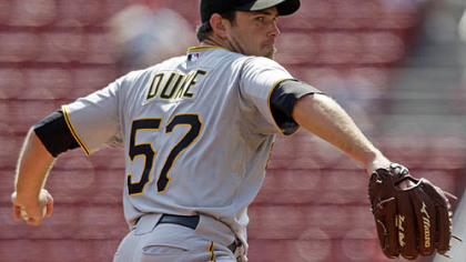 Pirates pitcher Zach Duke pitches against the Cincinnati Reds during the first inning.