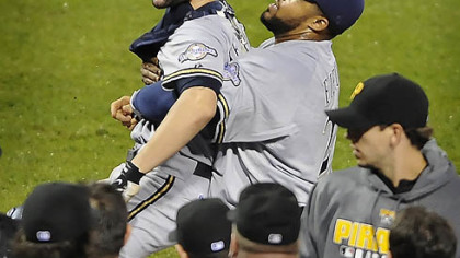 Brewers catcher Jason Kendall is held back by first baseman Prince Fielder during a bench- clearing incident in the eighth inning.