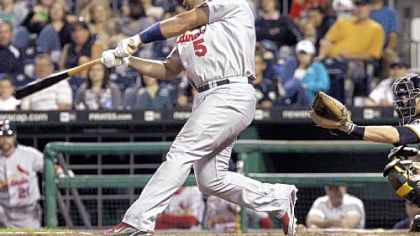 Albert Pujols connects with the winning home run against the Pirates in the 10th inning last night at PNC Park.