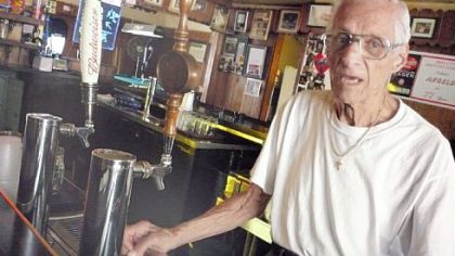 Angelo Cammarata, 95, behind the bar at Cammarata's in West View.