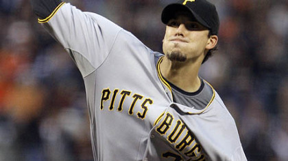 Pirates pitcher Charlie Morton works against the Giants during the third inning of last night's game in San Francisco.