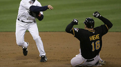 Padres second baseman David Eckstein throws to first after forcing out the Pirates' Eric Hinske in the second inning last night. The Pirates' Brandon Moss was safe at first.