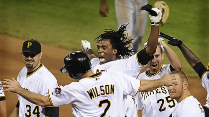 The Pirates' Andrew McCutchen celebrates with Jack Wilson after knocking in the winning run in the ninth inning against the Indians, June 25, 2009.