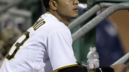 Pirates shortstop Ronny Cedeno watches the final out.