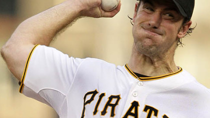 Pirates pitcher Ross Ohlendorf throws in the first inning.