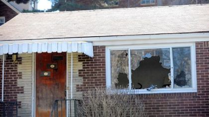 The front picture window is broken out at the Poplawski home at 1016 Fairfield St., Stanton Heights.