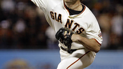 Giants pitcher Brian Wilson works against the Pirates during the ninth inning.