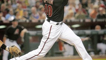 Justin Upton gives Arizona an early lead with a two-run homer in the fourth inning last night.