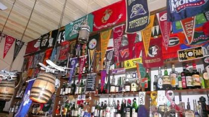 The interior of La Botticella is adorned not only in Steelers paraphernalia, but the banners of Western Pennsylvania colleges, too.