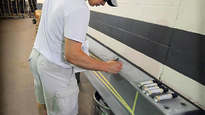 Sidney Crosby signs a steel beam that will soon become part of Consol Energy Center, the Penguins' new home in 2010.