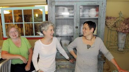 Lynne Bielewicz, left, Cathleen Enders and Gloria Fortunato are the owners of Wild Rosemary Bistro in Upper St. Clair.
 -->