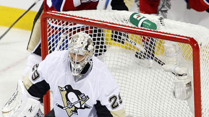 Maxim Lapierre, rear, gave the Canadiens a 3-1 lead late in the second period against Marc-Andre Fleury.