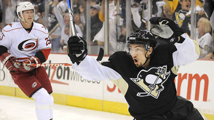 The Penguins' Miroslav Satan celebrates after scoring the first goal against the Hurricanes in their first Eastern Conference final game at Mellon Arena tonight.