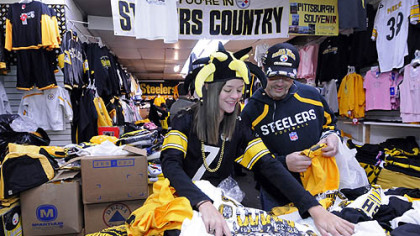 Jenna Surmick, 16, accompanied her father, Andy, on a visit to Steelers' merchandise vendor B.L Trading on Penn Ave. at 18th St. in Pittsburgh's Strip District today. The Surmicks live in Haddon Twp., N.J., and returned to Pittsburgh to watch the game with family and friends.