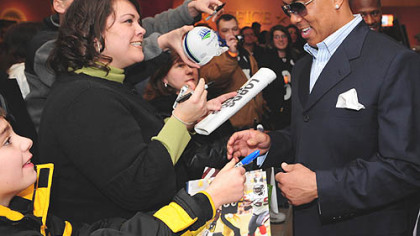 Hines Ward signs autographs before the debut of the NFL Films documentary on the Steelers' super season yesterday at the AMC Lowes Waterfront.