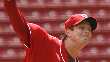 Reds pitcher Kip Wells throws against the Pirates in the first inning of the first game. The former Pirates pitcher gave up two earned runs in six innings.
