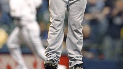 Starter Paul Maholm gathers himself after giving up a home run to Bill Hall leading off the sixth inning. The Brewers scored three times to take a 6-5 lead.