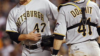 A hurting Evan Meek leaves Tuesday's game in the bottom of the ninth inning.