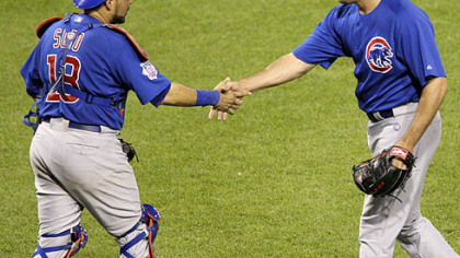 Chicago Cubs closer Kevin Gregg, right, and catcher Geovany Soto congratulate each other after the final out of the Cubs' 3-1 win last night.