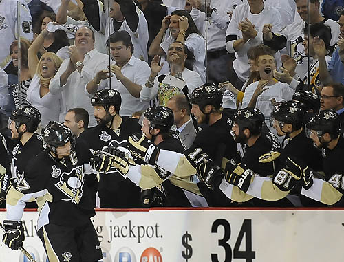 Penguins High Fiving