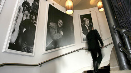 Photographs of The Beatles adorn the walls of the newly opened Hard Days Night Hotel, Friday, Feb. 1, 2008, in Liverpool, England. Visitors to Liverpool, birthplace of the Beatles, can rest their heads in the Lennon or McCartney suites at the Hard Days Night Hotel, a Fab Four-themed hostelry that opened Friday. More than 45 years after John, Paul, George and Ringo emerged from Liverpool's tiny, sweaty clubs to conquer the world, the Beatles industry is key to this battered-but-proud city's attempt to transform itself from fading commercial hub to thriving cultural hotbed. The 110-room Hard Days Night Hotel hopes to be its newest attraction.